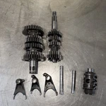 1996 Kawasaki Complete Transmission Drum Gear Shift Fork Shaft. Fixed Price $45.00.