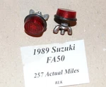 1989 Suzuki FA50 Oem Tag Reflectors With Wing Nuts & Springs .. (low 257 Miles). Fixed Price $18.00.
