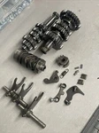 1987 Suzuki Transmission & Gear Shift Drum Forks Assembly. Fixed Price $75.00.